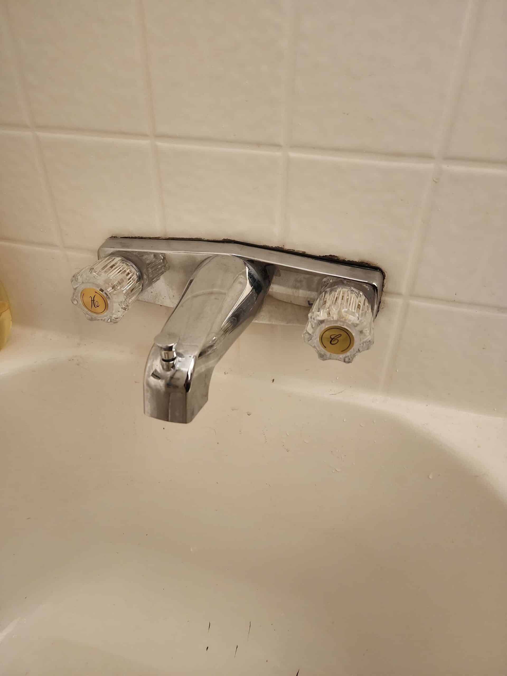 Repaired bathtub faucet with updated plumbing fixtures