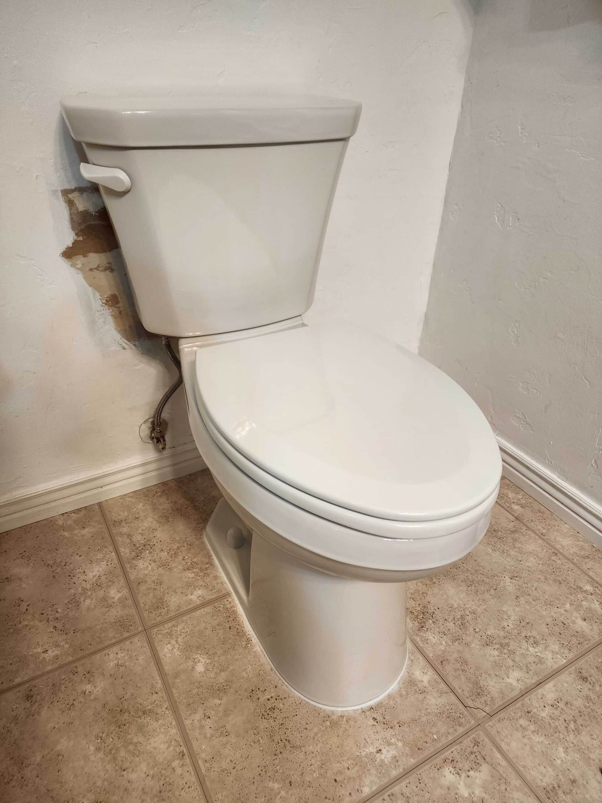 Newly installed residential toilet in bathroom