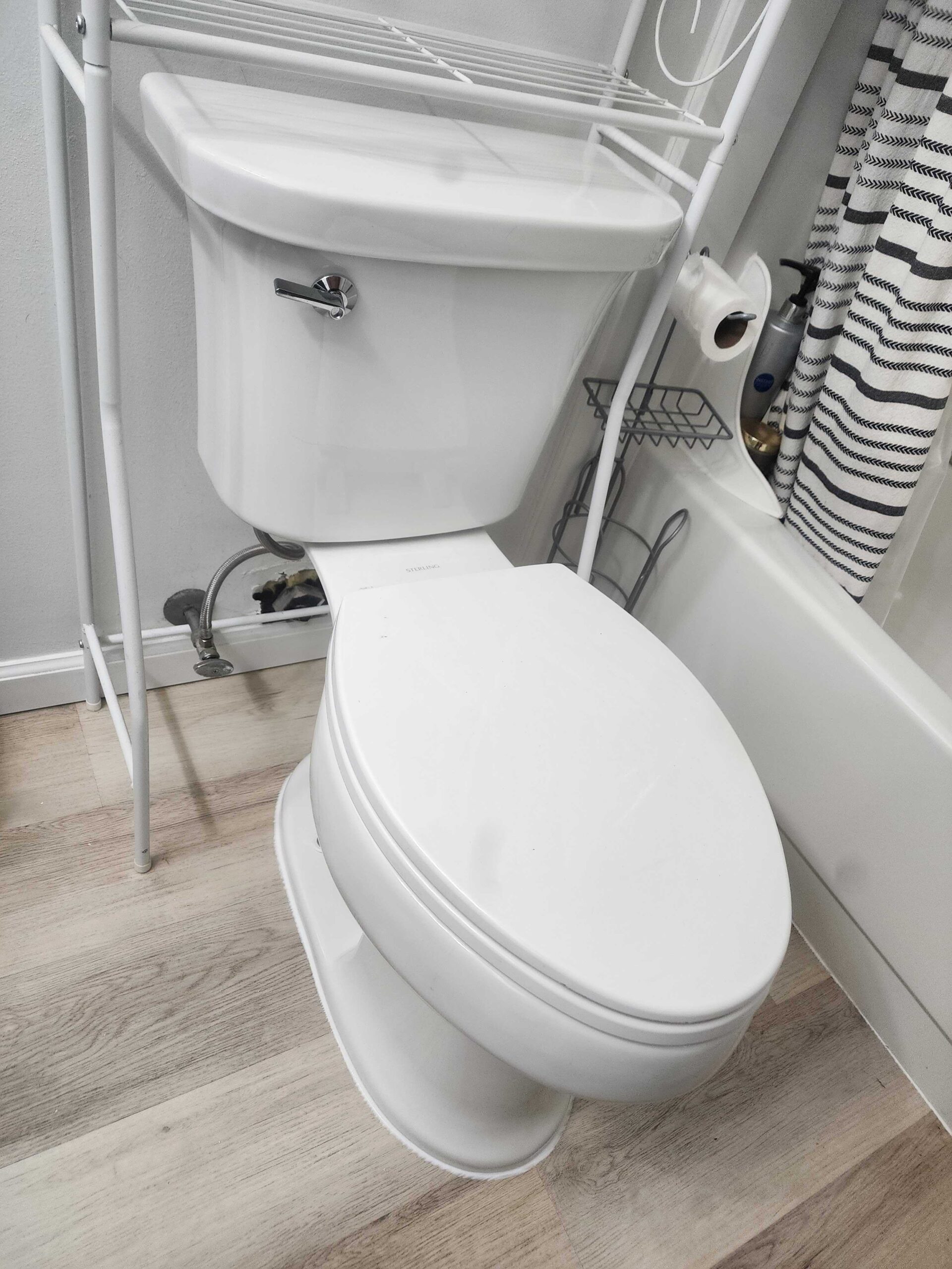 Residential toilet with completed plumbing repair