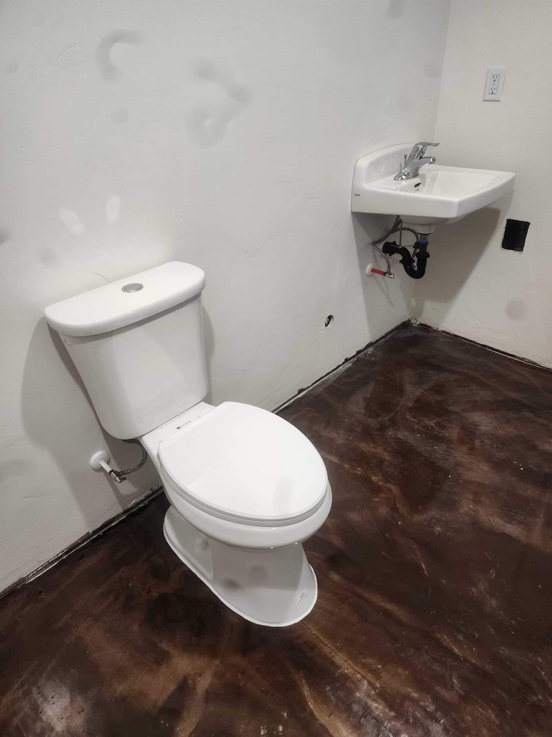 Newly installed toilet in residential bathroom